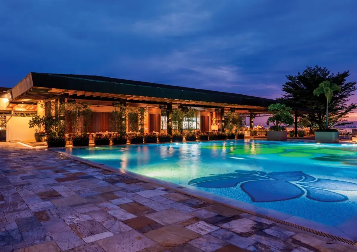 Luxury resort swimming pool and outdoor lounge featured by KGOLF on Instagram