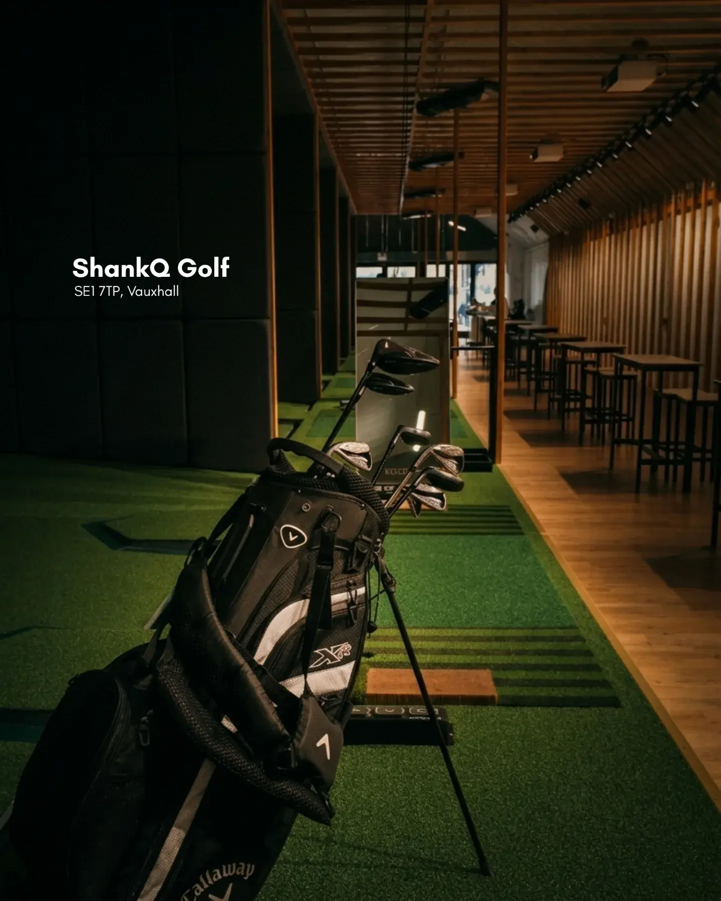ShankQ Golf Vauxhall indoor golf simulation venue with golf bag, simulator bay, and lounge seating