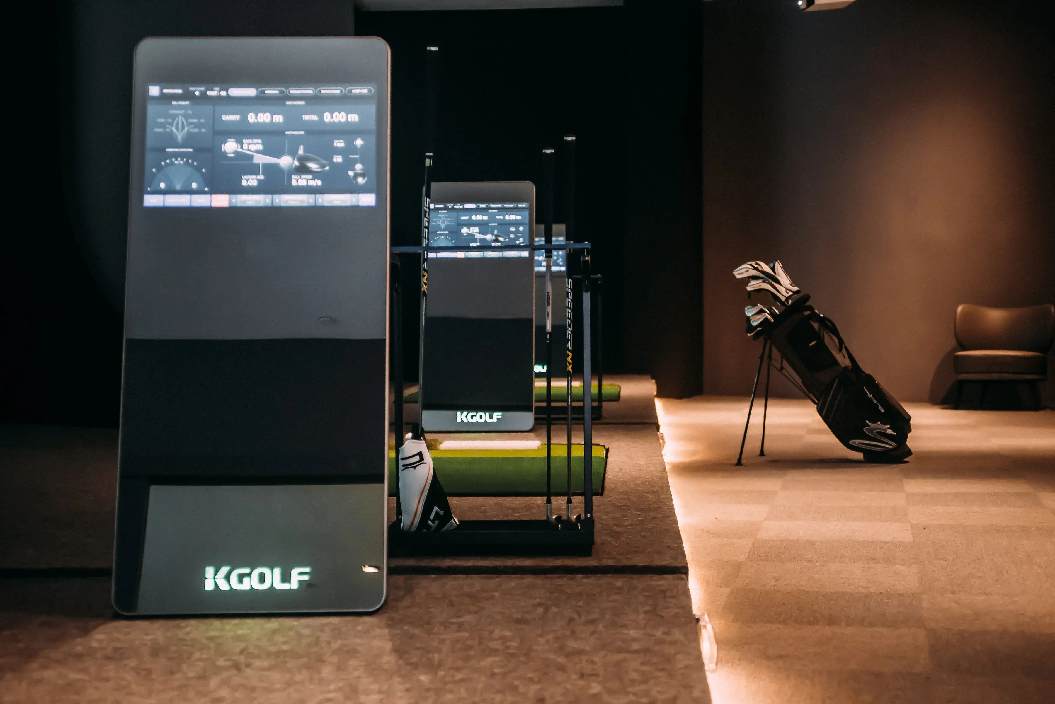 High-end golf simulator kiosk setup with premium interior for professional training