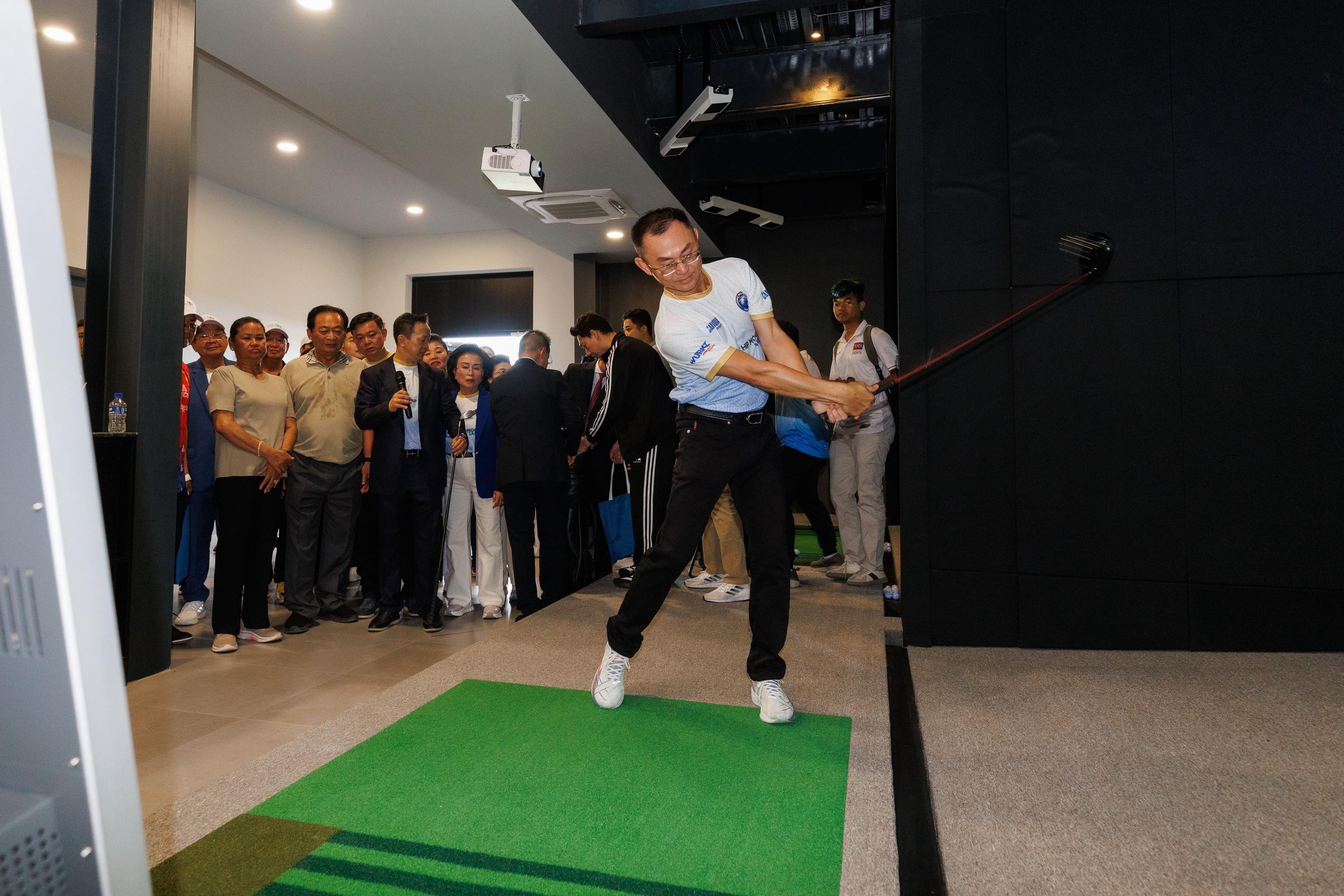 Visitors experienced the newly installed K-GOLF simulators during the official opening.