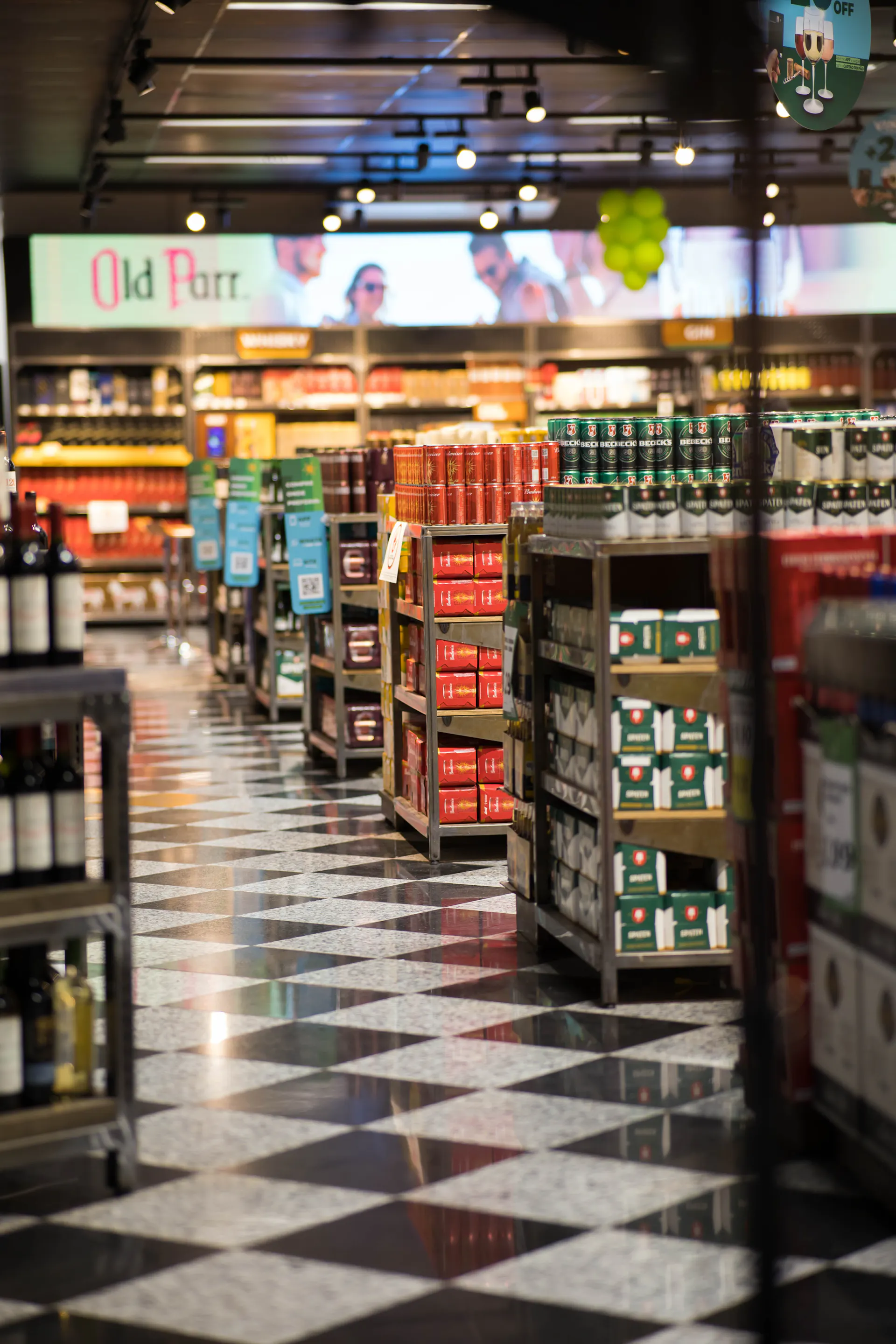 Quiet night retail store aisle showing unattended inventory work